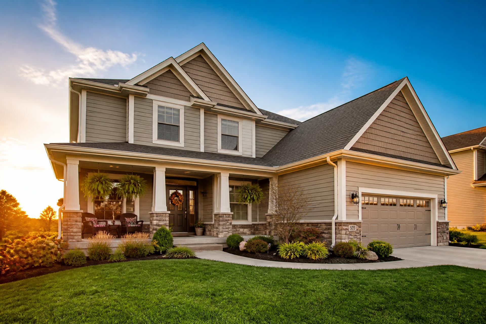 Beautiful Central Ohio home with clean gutters at sunset